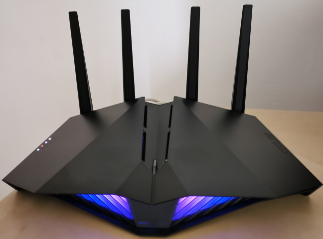 The RGB lighting on the front of the ASUS RT-AX82U