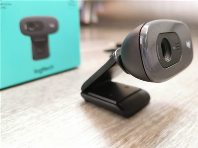 Logitech C270 HD Webcam standing on a plane surface