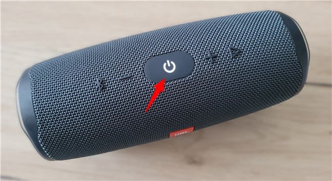 Powering on a Bluetooth portable speaker