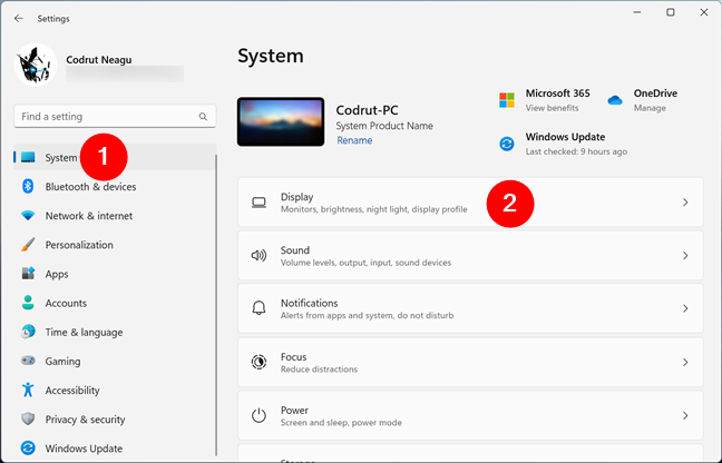 Open Settings and head to System > Display