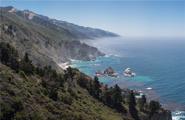 The latest Mac OS version is called Big Sur, like this Californian coastline