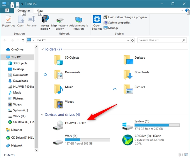 The smartphone is shown as a device in File Explorer