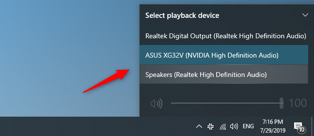 Choosing the default playback device in the Sound flyout