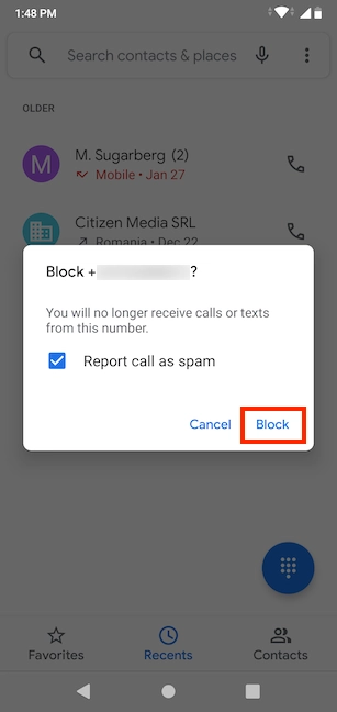 Confirm by tapping Block