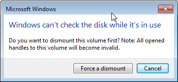 Windows 7 can't check a disk while it is in use