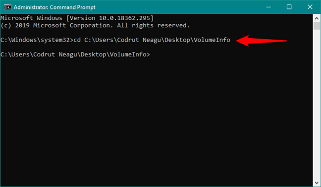 Using the CD command to navigate to the location of the volumeinfo.exe file