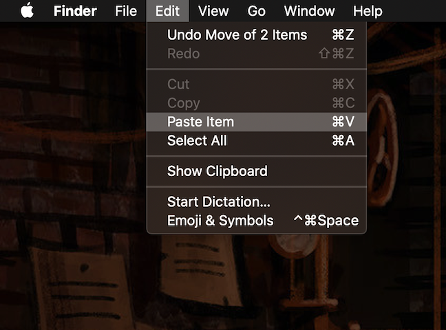 Use Paste from the Finder's Edit menu