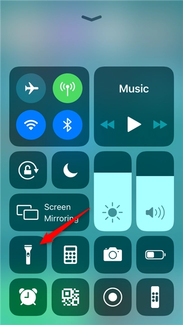 Adjusting the brightness of the flashlight, on an iPhone
