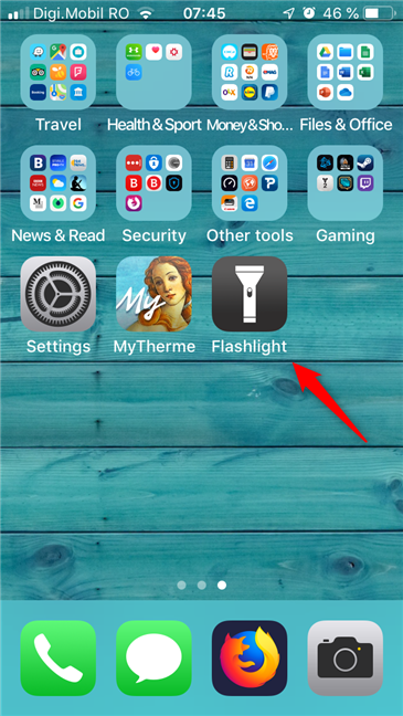 A Flashlight app installed and available on the home screen of an iPhone