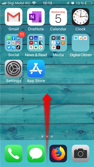 Opening the Control Center on an iPhone SE