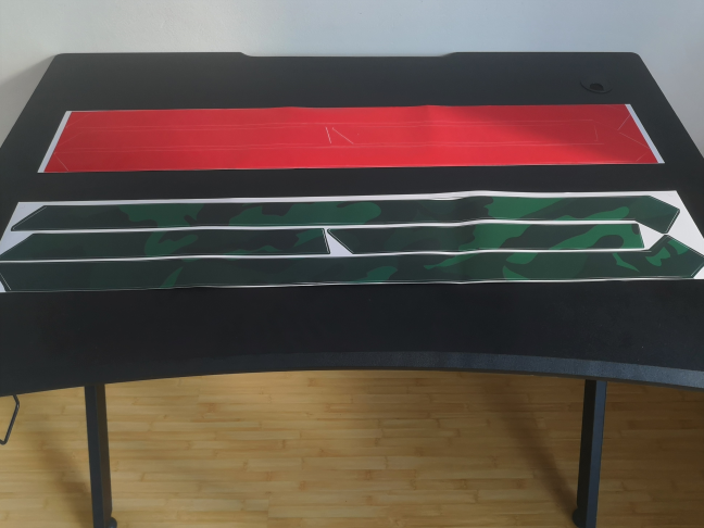 The stickers for the Trust GXT 711 Dominus gaming desk