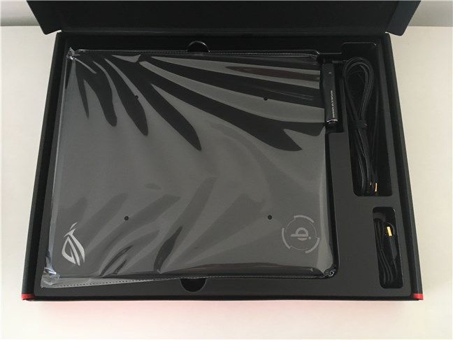 The package contents for the ASUS ROG Balteus Qi mouse pad