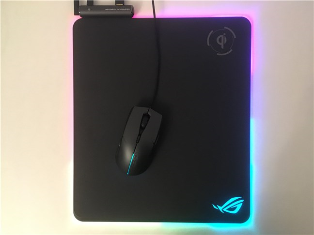 The ASUS ROG Balteus Qi mouse pad with an ASUS ROG Strix Evolve mouse