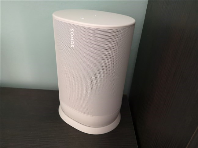 A perspective of the Sonos Move seated on the charging plate