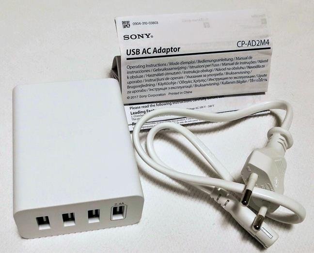 The content of the package containing the Sony CP-AD2M4 charger