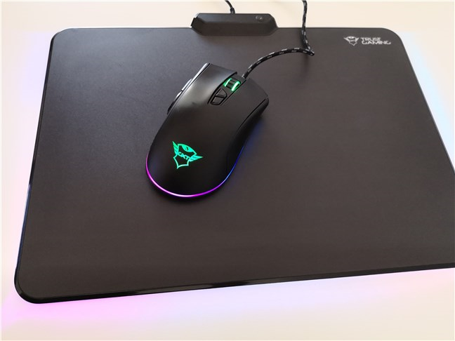 The Trust GXT 900 Kudos gaming mouse on a mousepad