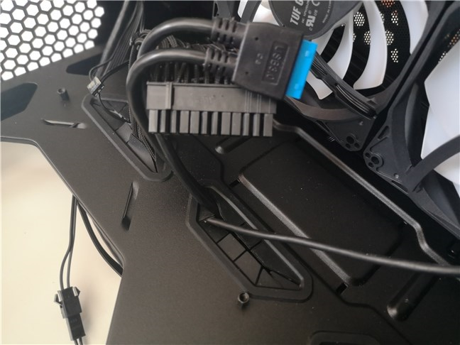 The ASUS TUF Gaming GT301 computer case with the standoff screws mounted