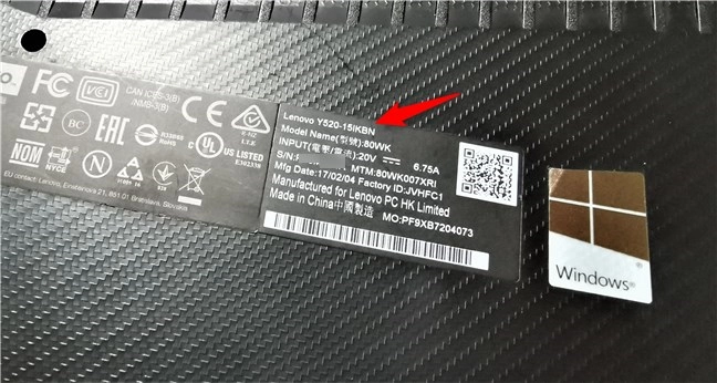 Where to find the model of a laptop: it's possible to be printed on its back