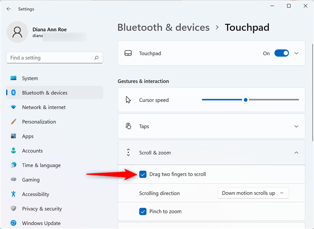 Have the touchpad scroll when you drag two fingers on it