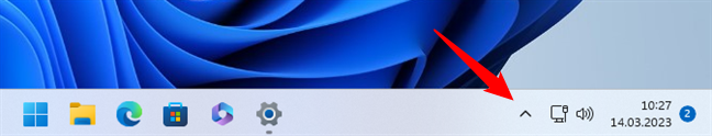 The hidden icon menu button from Windows 11's system tray