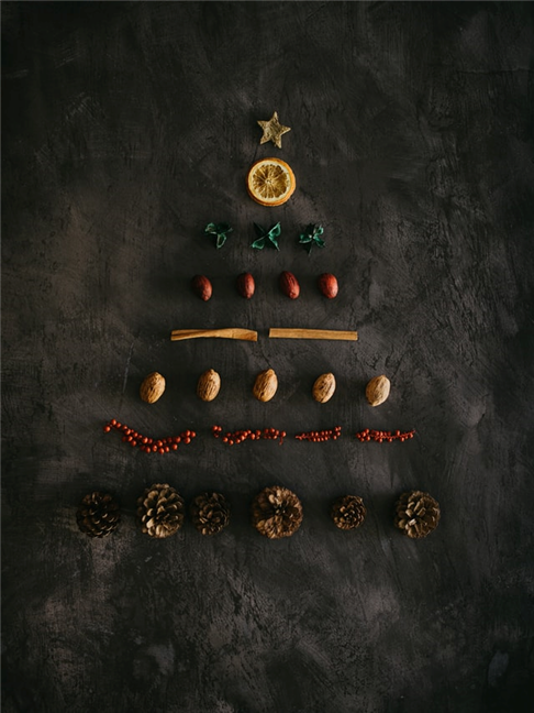 Ornaments on dark gray background by Annie Spratt