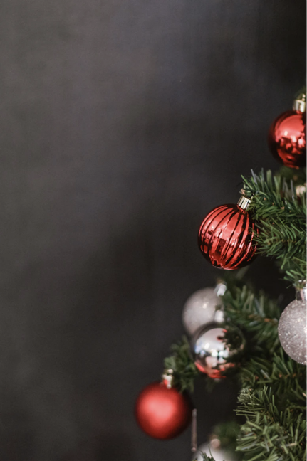 Christmas wallpaper with baubles and dark gray background by Sincerely Media