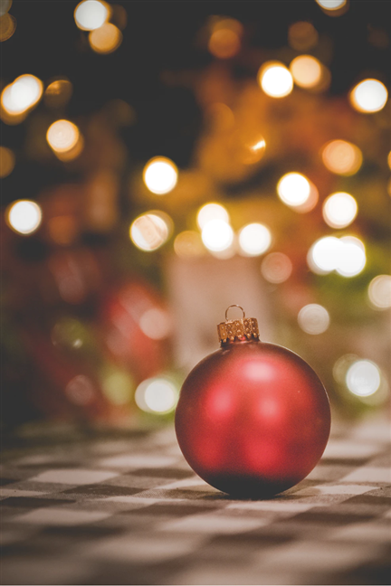 Selective focus photography of red Christmas bauble by Todd Trapani