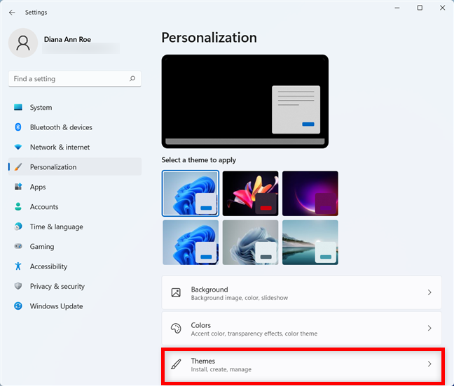 Access the Themes section from the Personalization tab