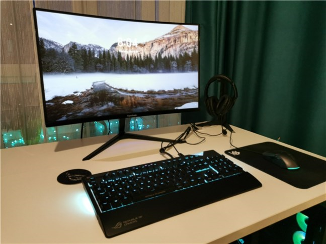 The ViewSonic VX2719-PC-MHD gaming monitor mounted on my desk