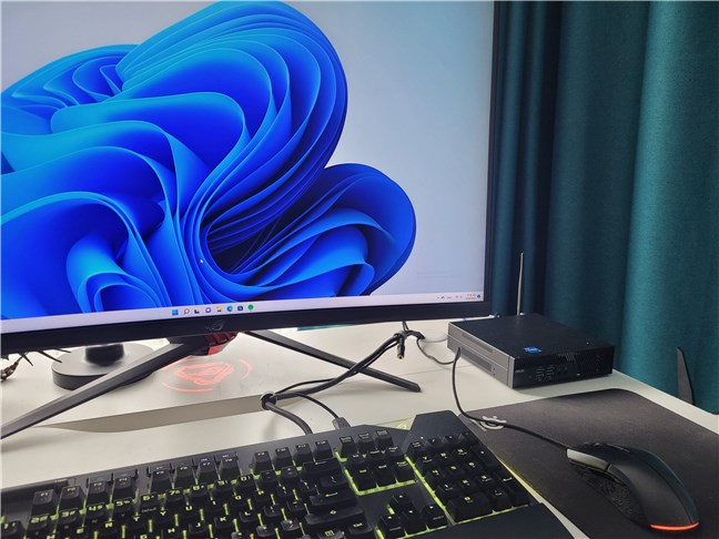 What the ASUS Mini PC PB62 looks like on an average sized desk