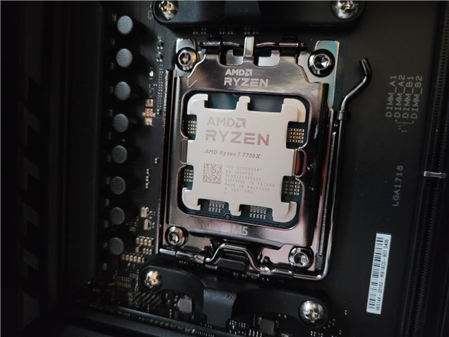 AMD Ryzen 7 7700X mounted on an X670E motherboard