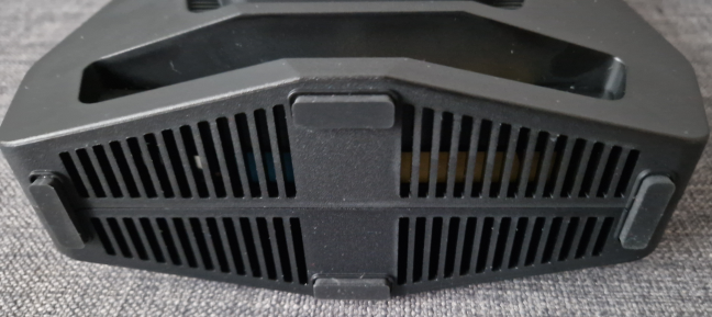 Four rubber feet hold the Synology WRX560 into place