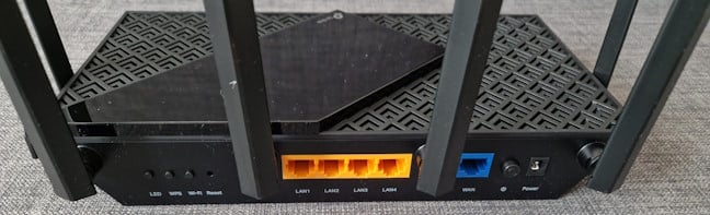 The ports on the back of the TP-Link Archer AX73