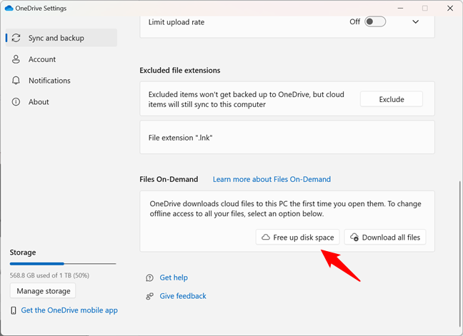 Click or tap the Free up disk space button in OneDrive Settings