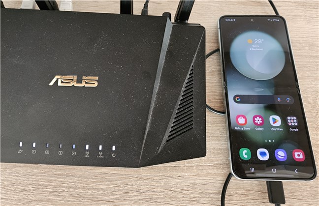 Connect your phone to the router's USB port