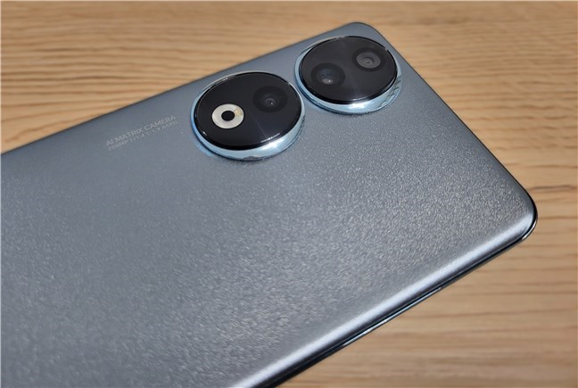 The rear camera setup has wide, ultrawide, and depth lens