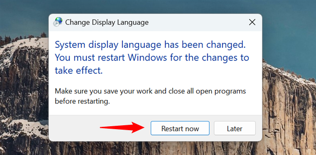 Restart your Windows computer to change the lock screen language