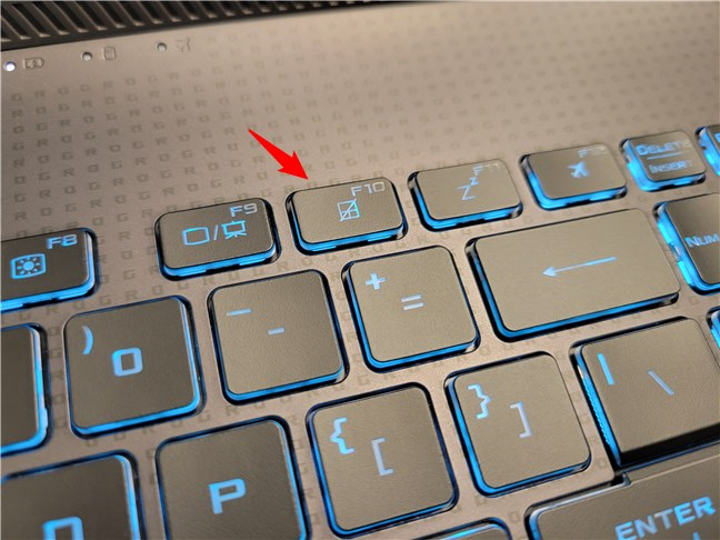 Find the key that looks like a touchpad