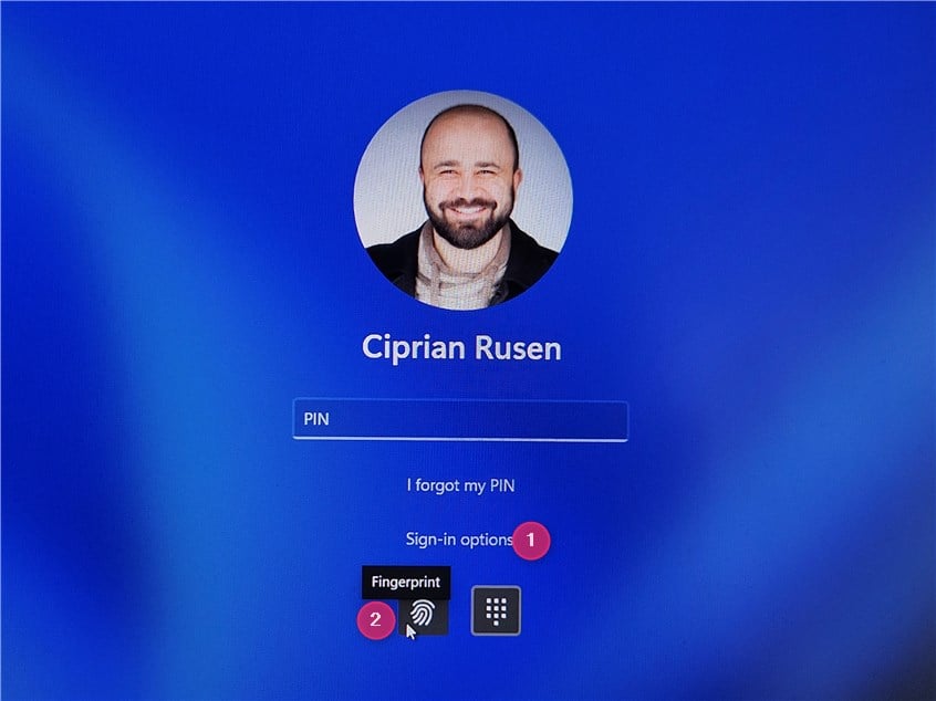 Click or tap Sign-in options and choose Fingerprint