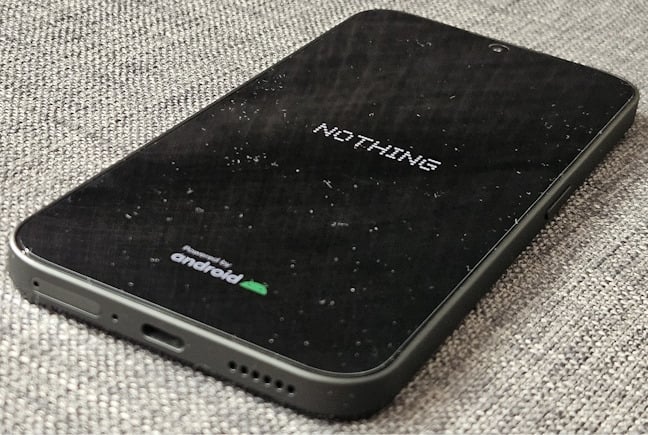 The bottom side of the Nothing Phone (2a)