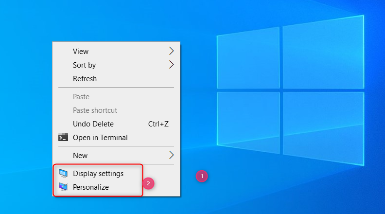 Right-click the desktop and choose Display settings or Personalize