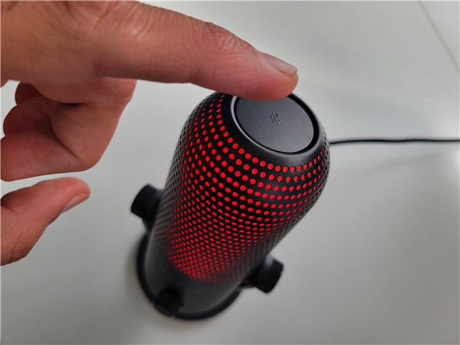The tap-to-mute touch surface