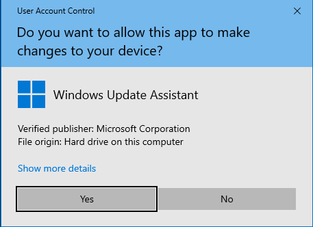 Run Windows10Upgrade9252.exe and press Yes