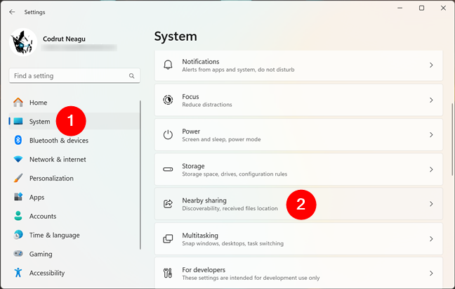 Open Settings, go to System, and click Nearby sharing