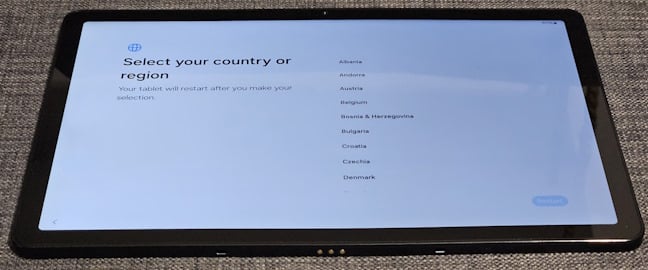The tablet's display has a TFT panel