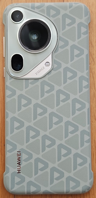 The bundled case looks good and makes it easier to hold the phone
