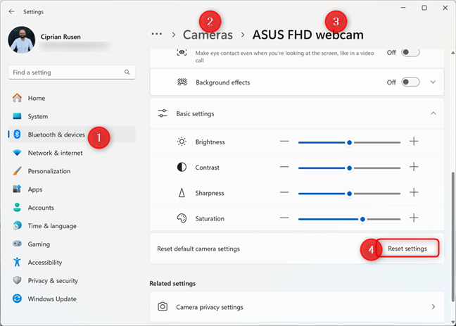 In the webcam's settings, click or tap Reset settings