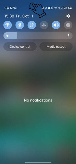 Swipe down to reveal Quick Settings