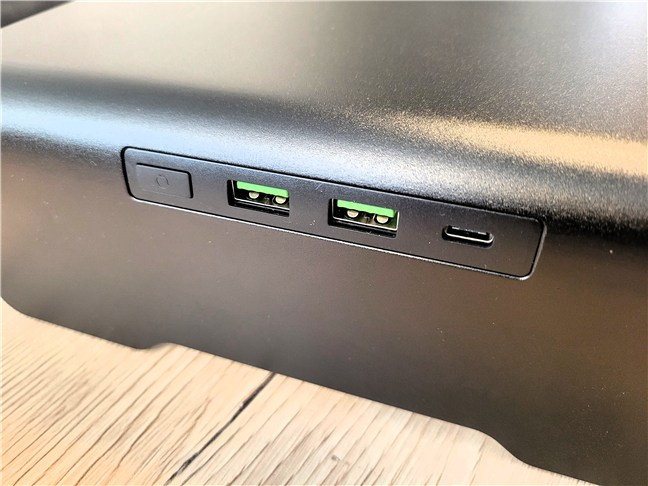 There are USB ports on the right side of the stand