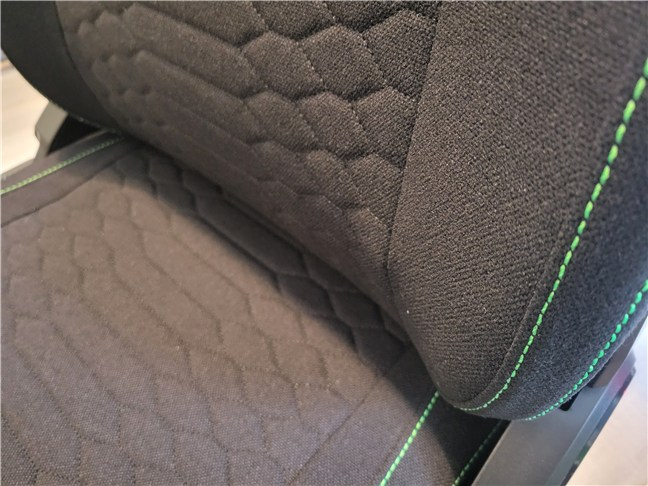 The lumbar support is fixed and built-in